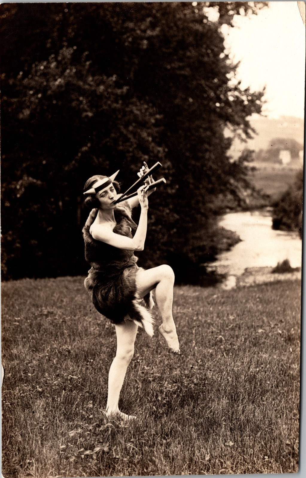 Postcard Real Photo RPPC Woman Dancing in Costume Playing Instrument