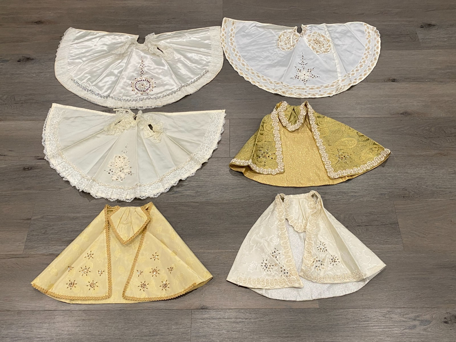 COLLECTION OF 6 VINTAGE INFANT OF PRAGUE STATUE VESTMENTS COLLECTION OF 6 VINTAGE INFANT OF PRAGUE STATUE VESTMENTS