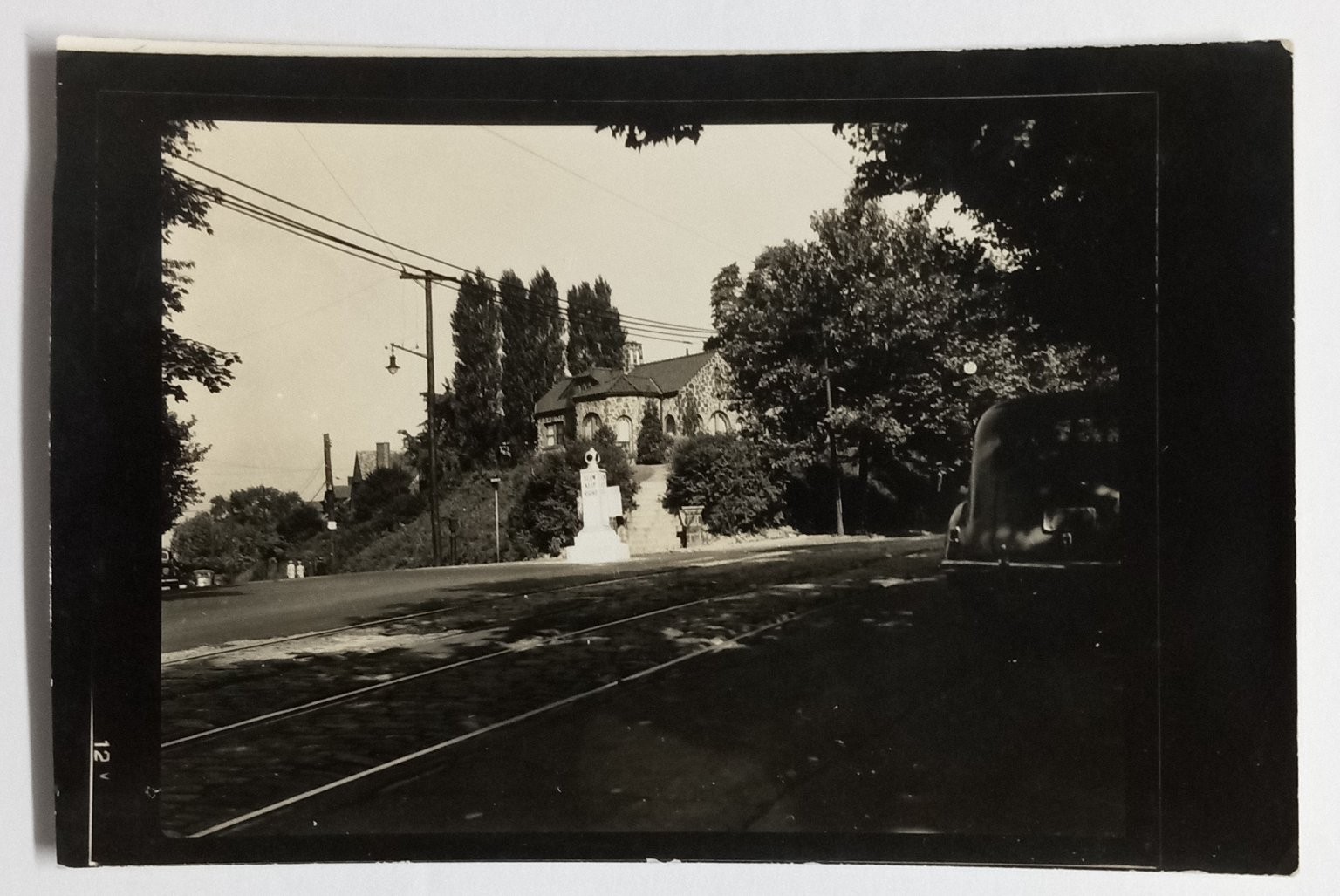 Vintage Real Photo Postcard Street Scene Tram Tracks Monument Stone Building a Vintage Real Photo Postcard Street Scene Tram Tracks Monument Stone Building a