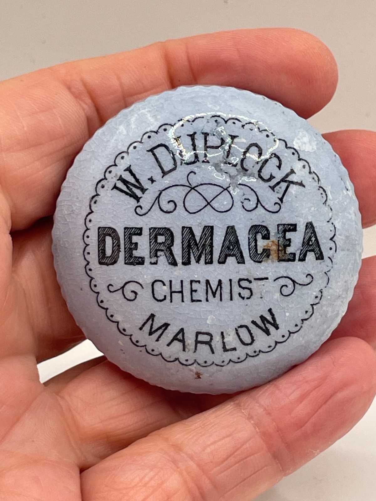 Antique porcelain bottle top W. Cup Duplock chemist Dermacea Blue