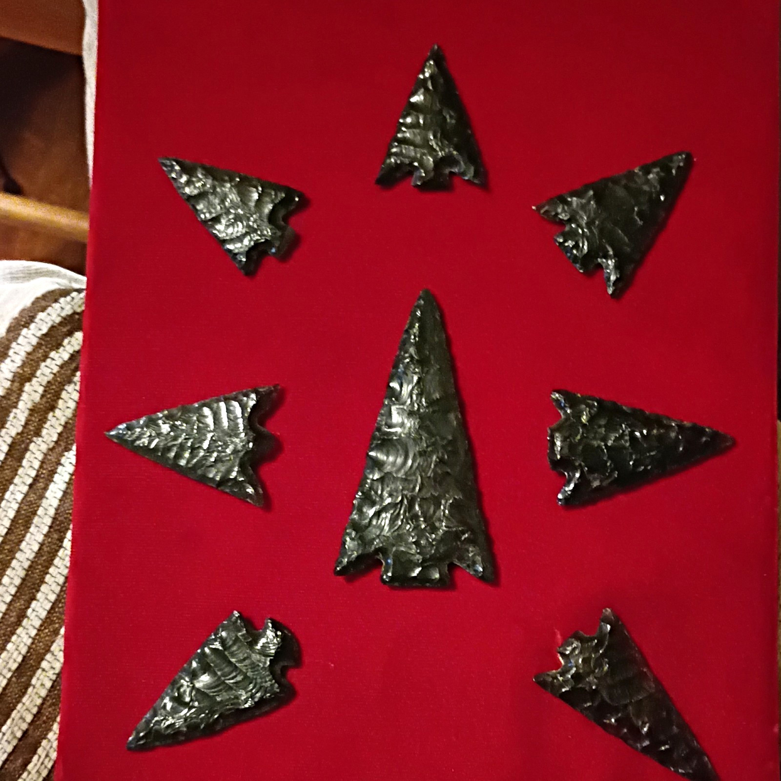 Lot of 7 Knapped Stone Arrowhead Points on Red Display, Blackrock Desert,Utah,