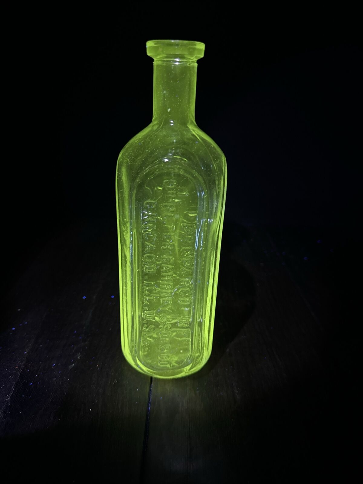 Vintage clear Manganese Uranium Glass Medicine Bottle Dr.Peter Fahrney & Sons