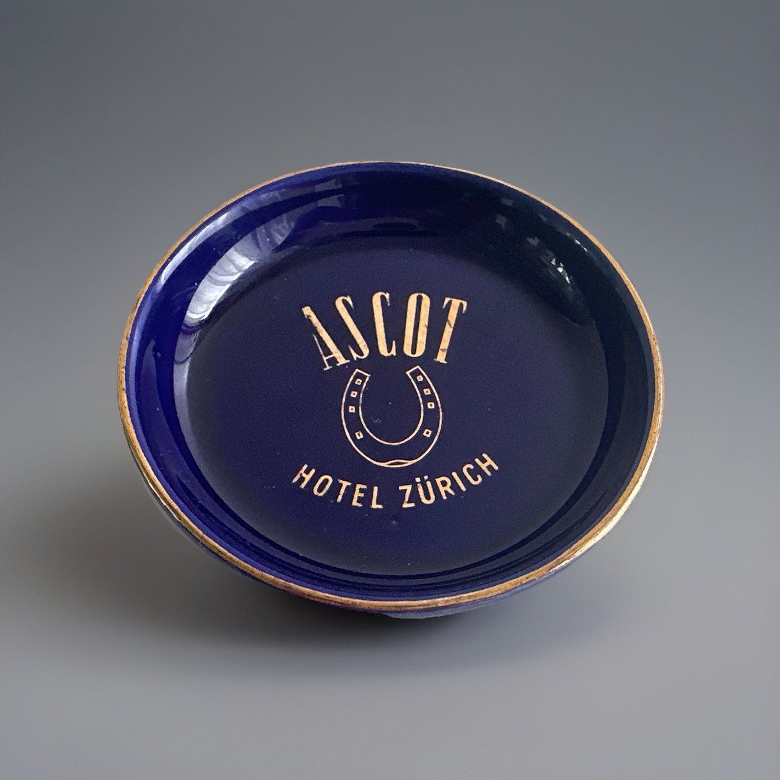 Vintage Ascot Hotel Zurich Ashtray Fuhrmann Neuchatel Cobalt Blue Gold 3.25 Vintage Ascot Hotel Zurich Ashtray Fuhrmann Neuchatel Cobalt Blue Gold 3.25