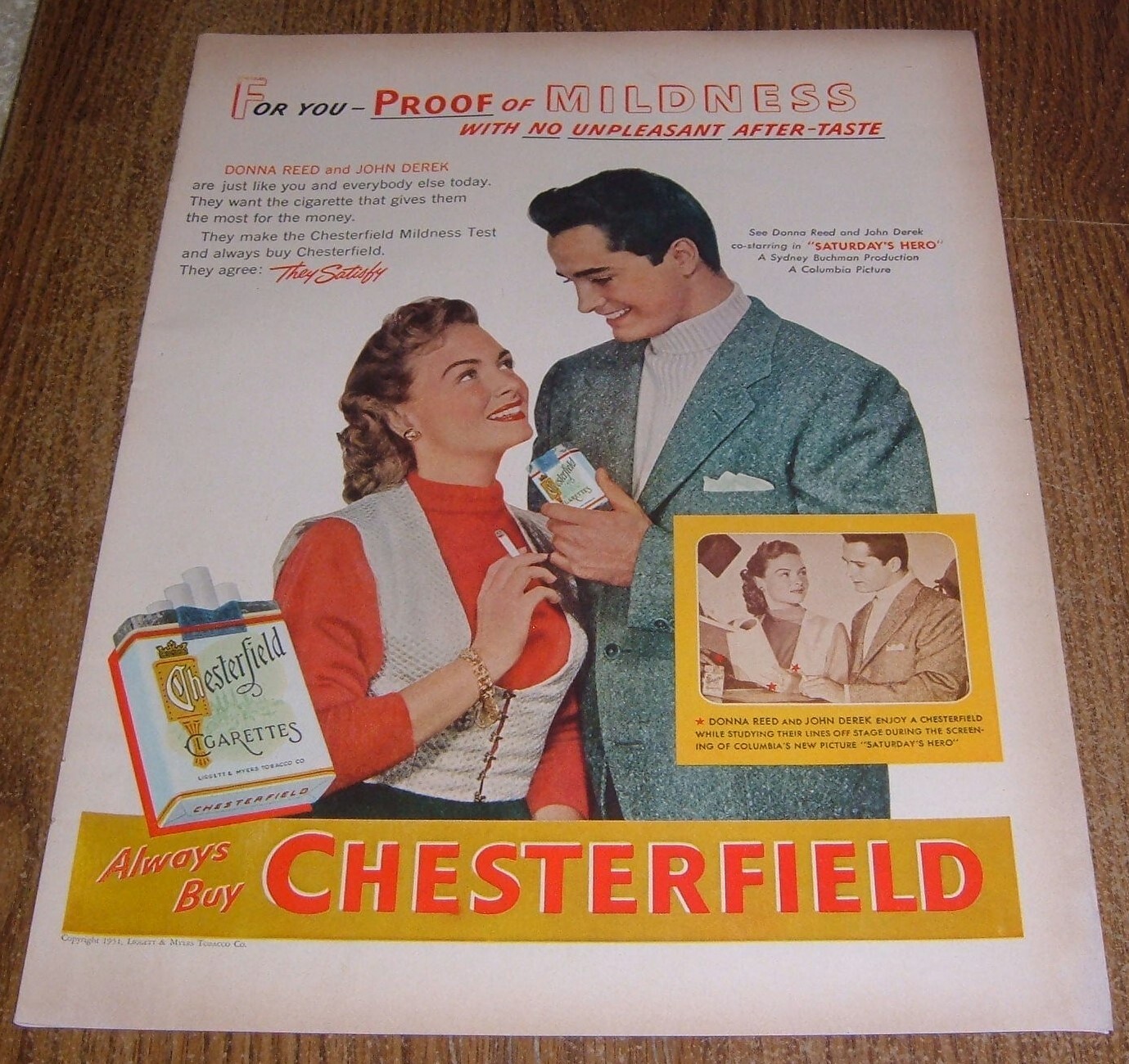 1951 PRINT AD CHESTERFIELD CIGARETTES DONNA REED & JOHN DEREK in SATURDAY\'S HERO