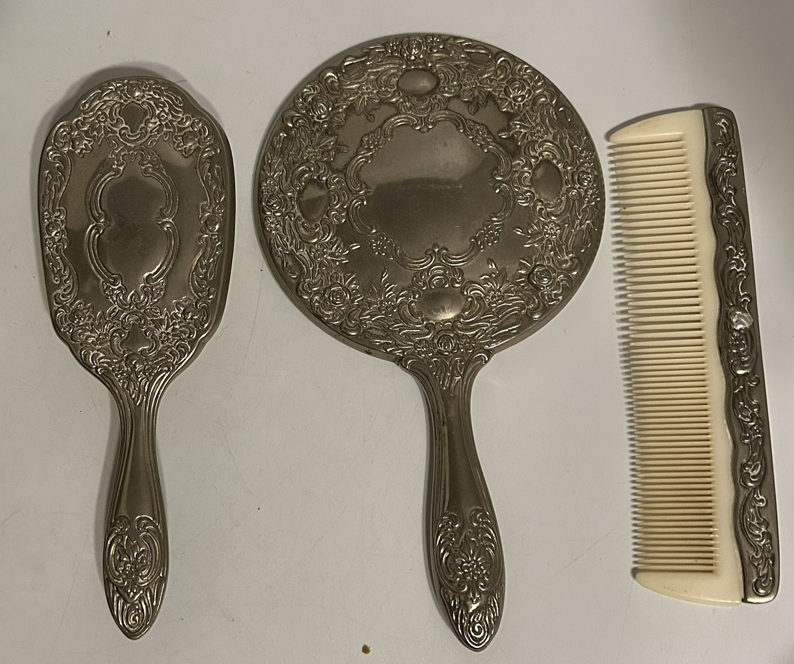 Vintage Vanity Set Silver Plate Hand Mirror Brush Comb 3 Piece Ornate Vintage Vanity Set Silver Plate Hand Mirror Brush Comb 3 Piece Ornate