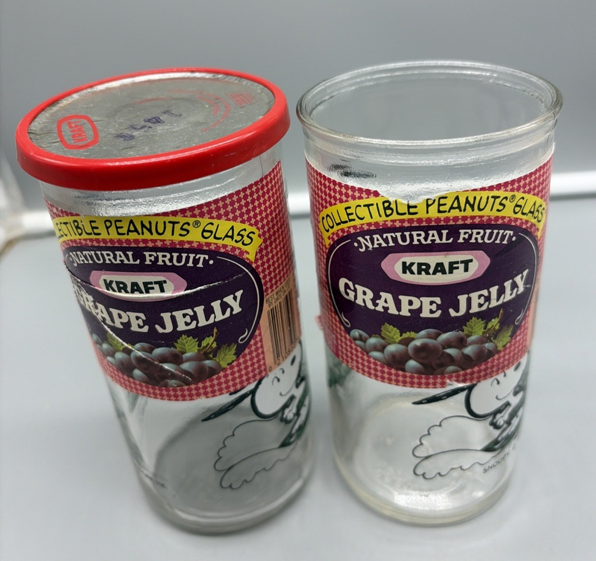 Vintage Lot Of (2) 1958 Kraft Grape Jelly Promotional Glass Jars Peanuts Vintage Lot Of (2) 1958 Kraft Grape Jelly Promotional Glass Jars Peanuts