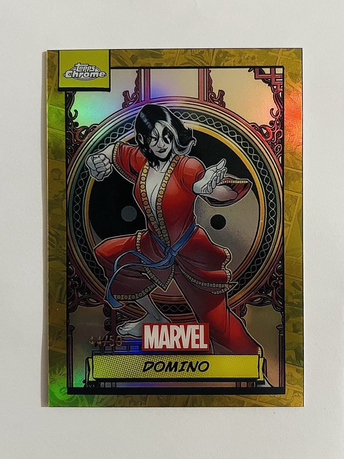 2024 Topps Chrome Marvel #67 Domino Gold Refractor /50