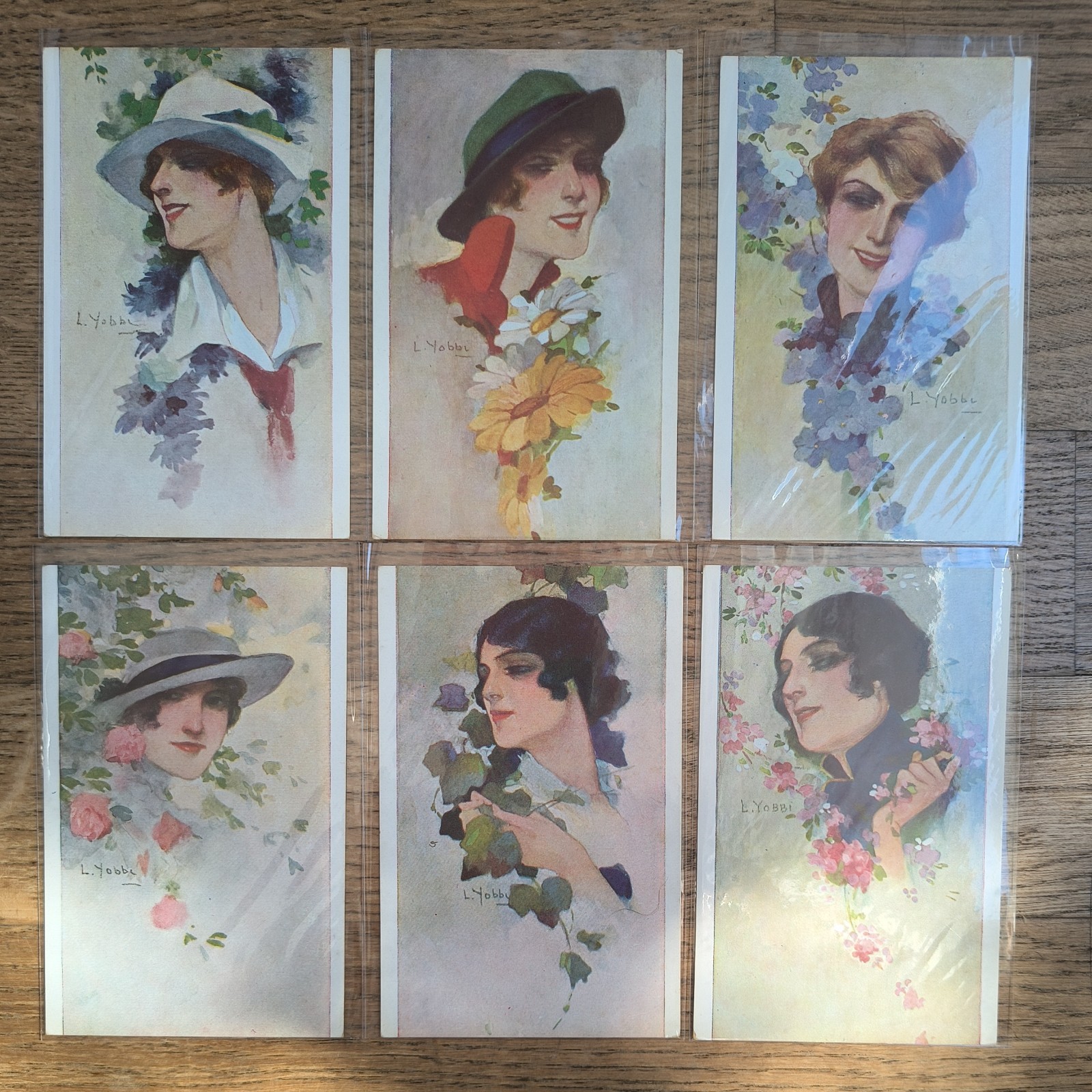 ART DECO LIBERTY ART NOVEAU ILL. YOBBI L. SERIES OF 4 POSTCARDS WOMEN WOMEN