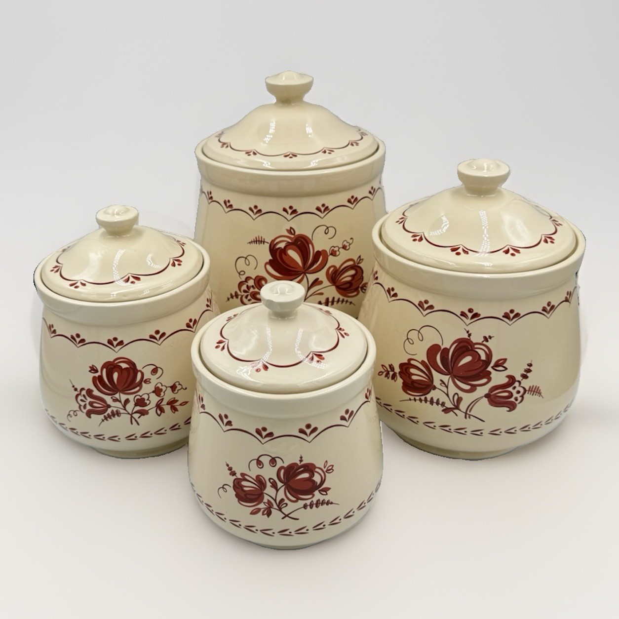 David Davir 4 Piece 1980’s Country Ceramic Canister Set Cream Red Floral Design David Davir 4 Piece 1980’s Country Ceramic Canister Set Cream Red Floral Design
