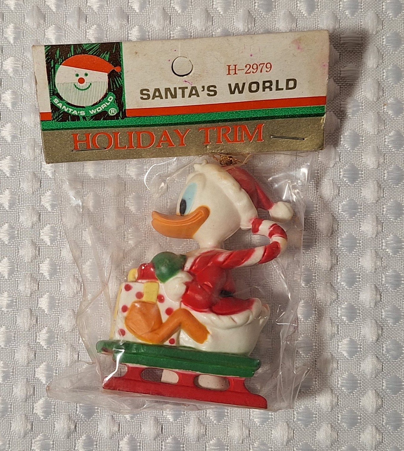 Vintage Santa's World Disney Donald Duck On Sled Kurt Adler Christmas Ornament