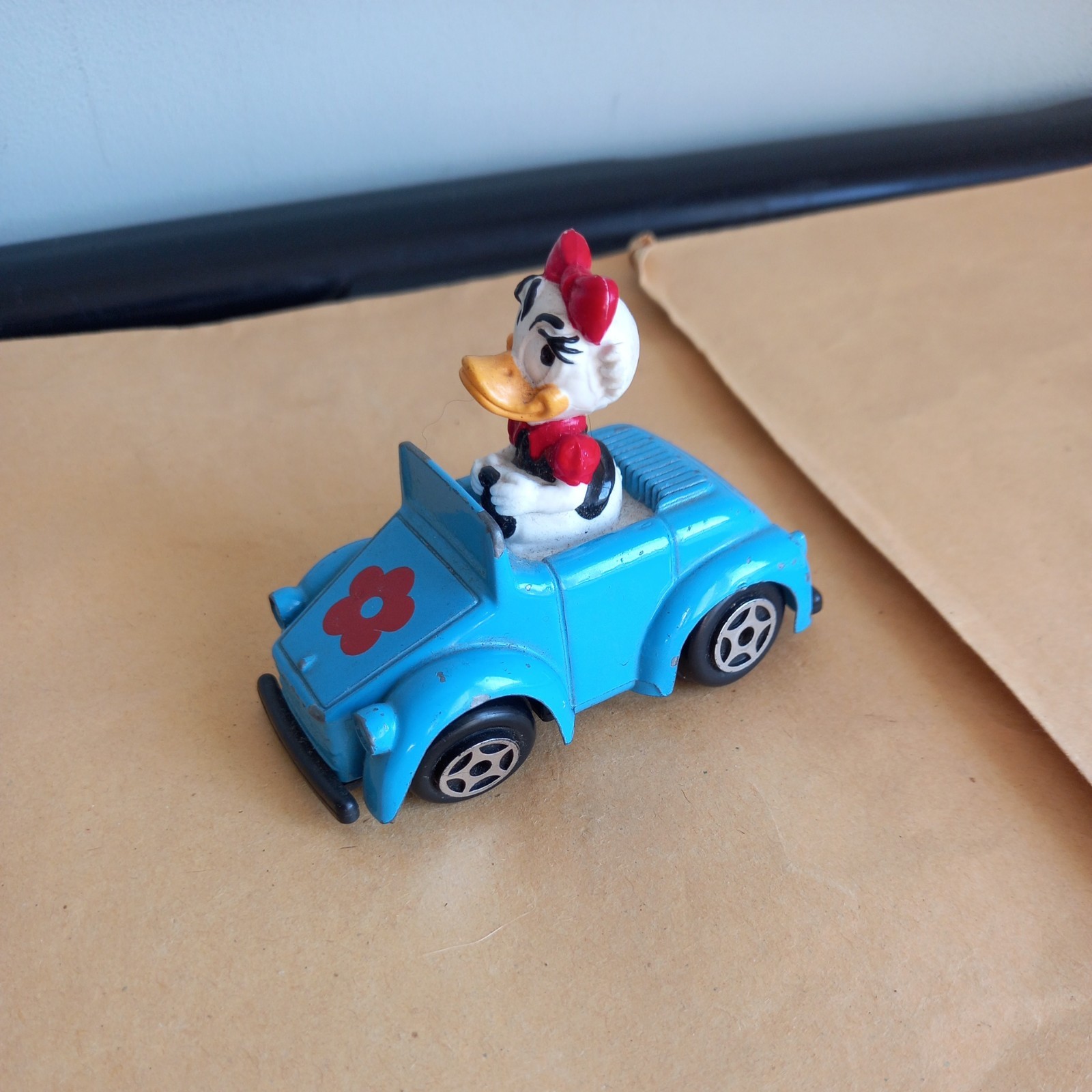 Vintage Disney  Esci Daisy Duck 1983 Die-cast car - With some paint loss.