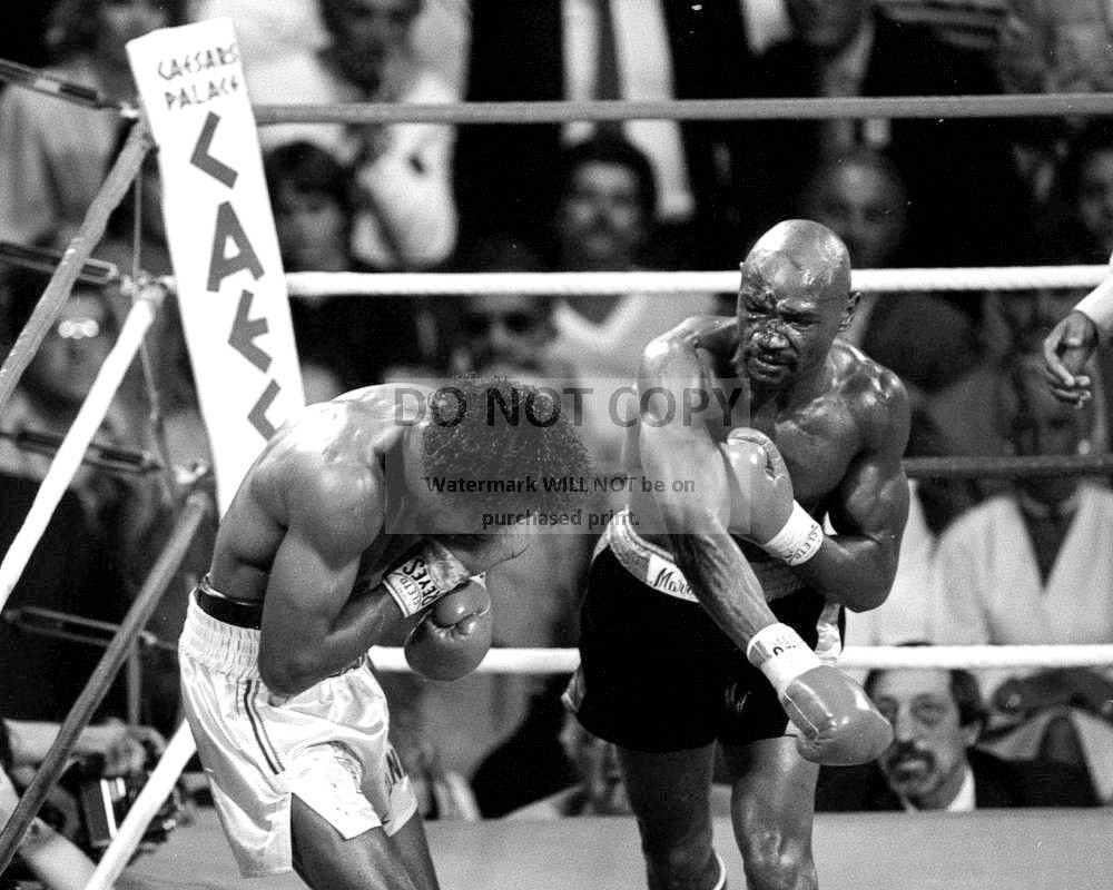 MARVELOUS MARVIN HAGLER AND THOMAS HEARNS FIGHT IN 1985 - 8X10 PHOTO (BB-992)