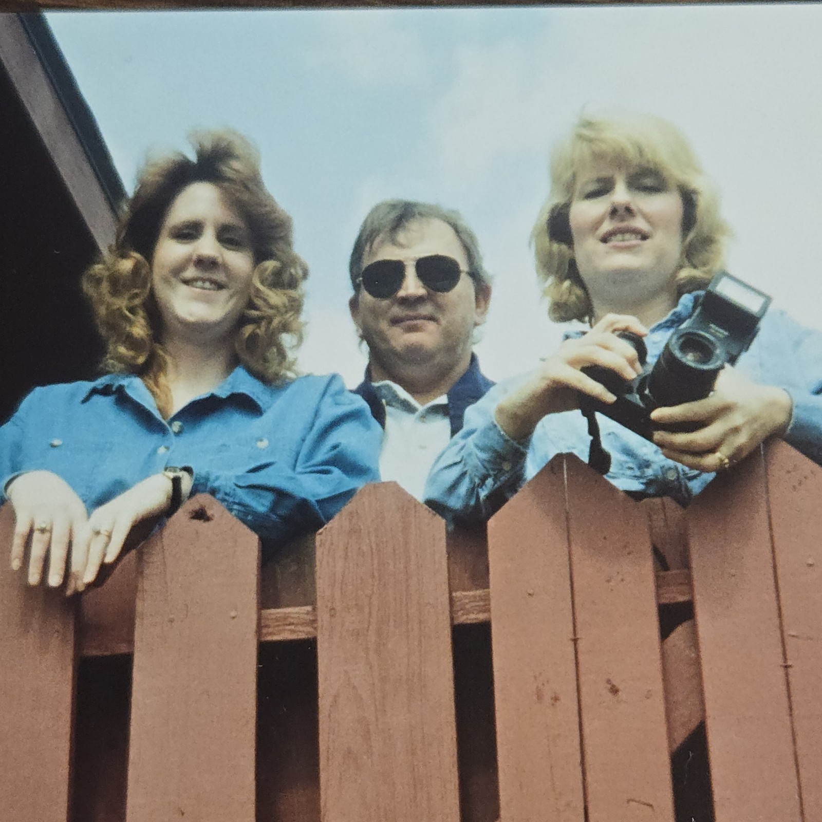Vintage Photo Snapshot of People Looking Over Wood Fence w/ Camera in Hands Vintage Photo Snapshot of People Looking Over Wood Fence w/ Camera in Hands
