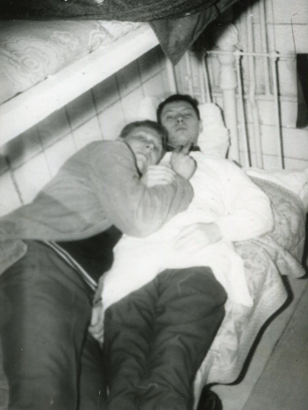 Affectionate Handsome young men couple hug in bed gay int vintage photo