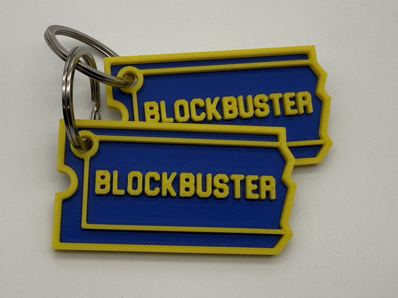 Blockbuster Keychain X2 (2 Pcs) Blockbuster Keychain X2 (2 Pcs)