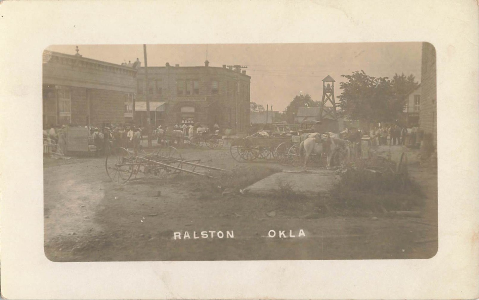 c1910 Ralston Oklahoma Main Street Bank RPPC Photo Postcard Horses Crowd