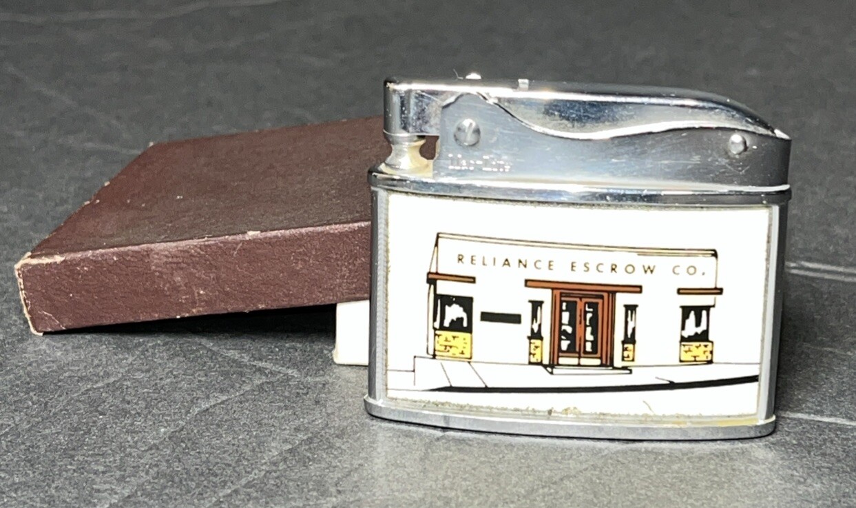 Vintage-Reliance Escrow flat advertising lighter Vintage-Reliance Escrow flat advertising lighter