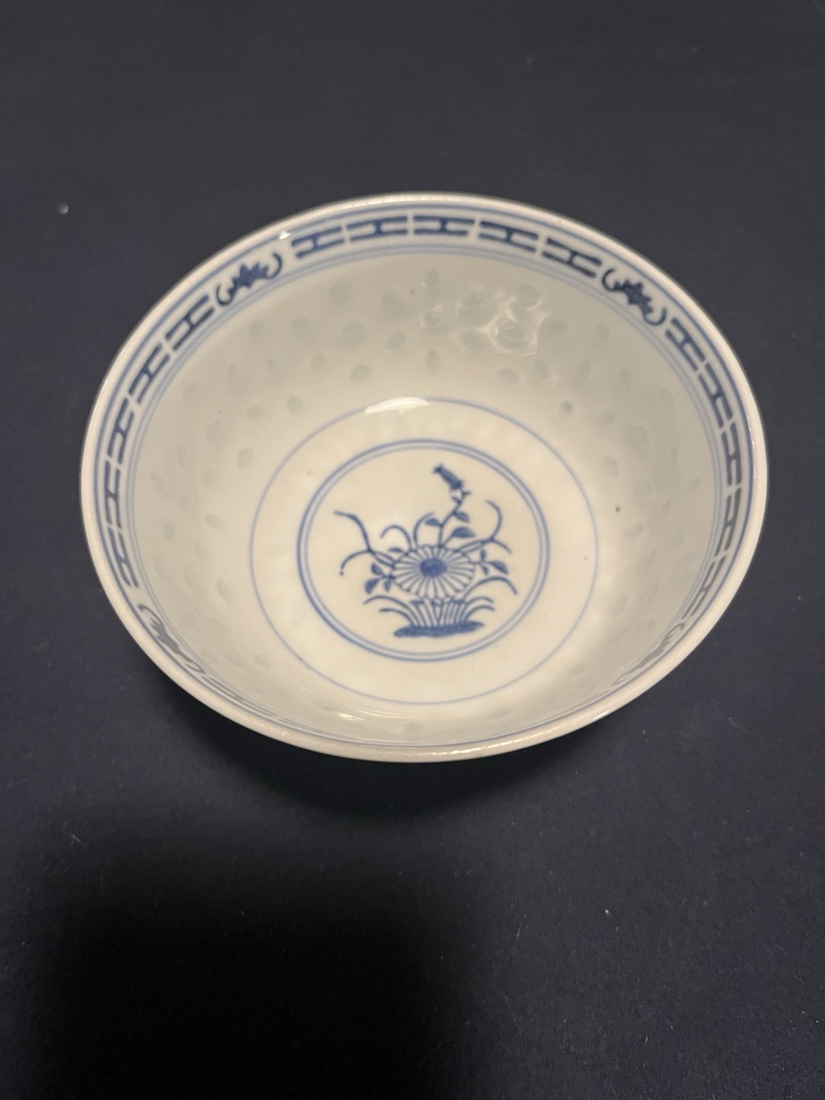 VTG Chinese translucent chrysanthemum flower with “rice eye” porcelain bowl. VTG Chinese translucent chrysanthemum flower with “rice eye” porcelain bowl.