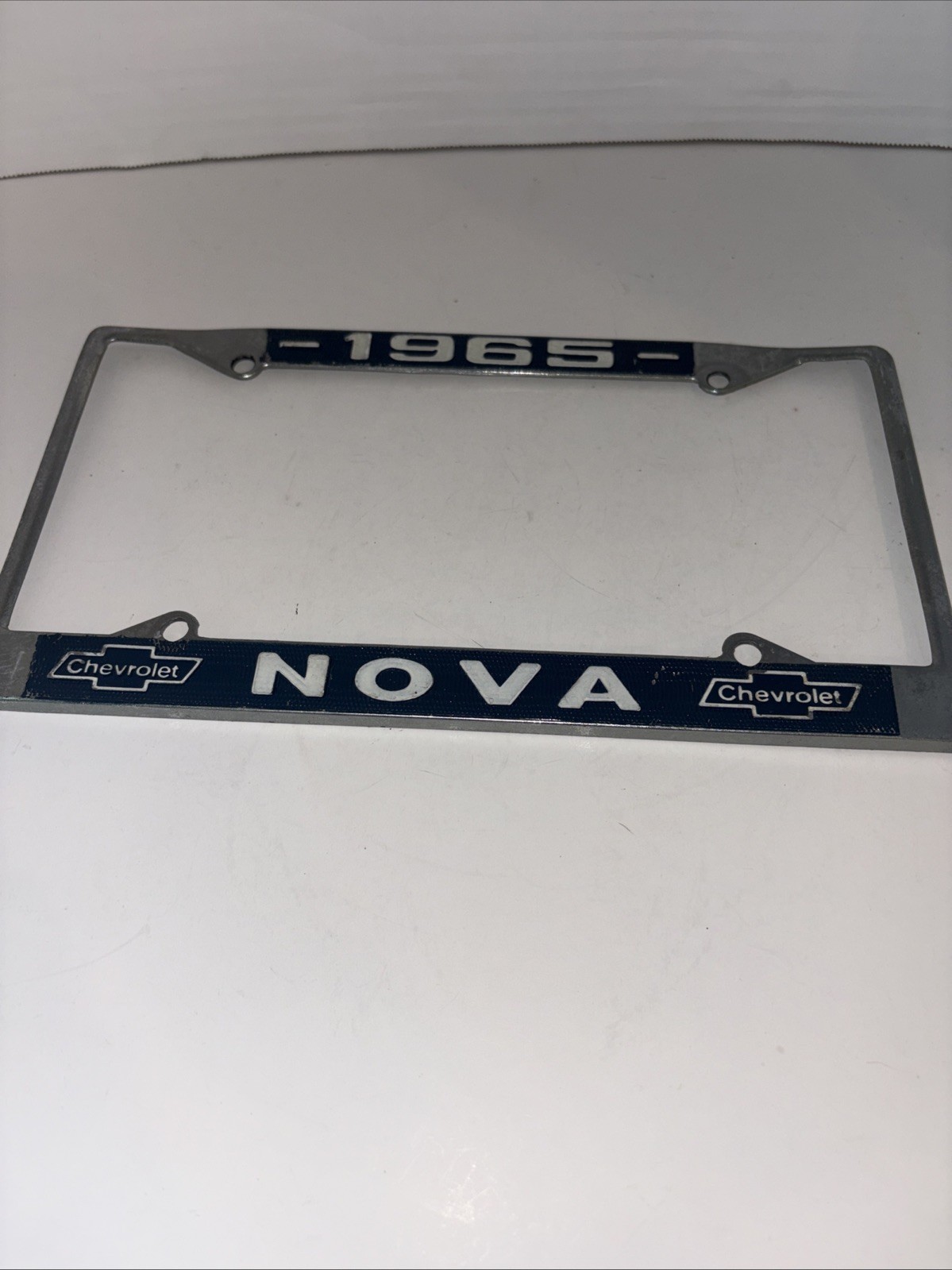 Vintage 1965 Chevrolet Nova Booster License Plate Frame Chevy METAL Vintage 1965 Chevrolet Nova Booster License Plate Frame Chevy METAL