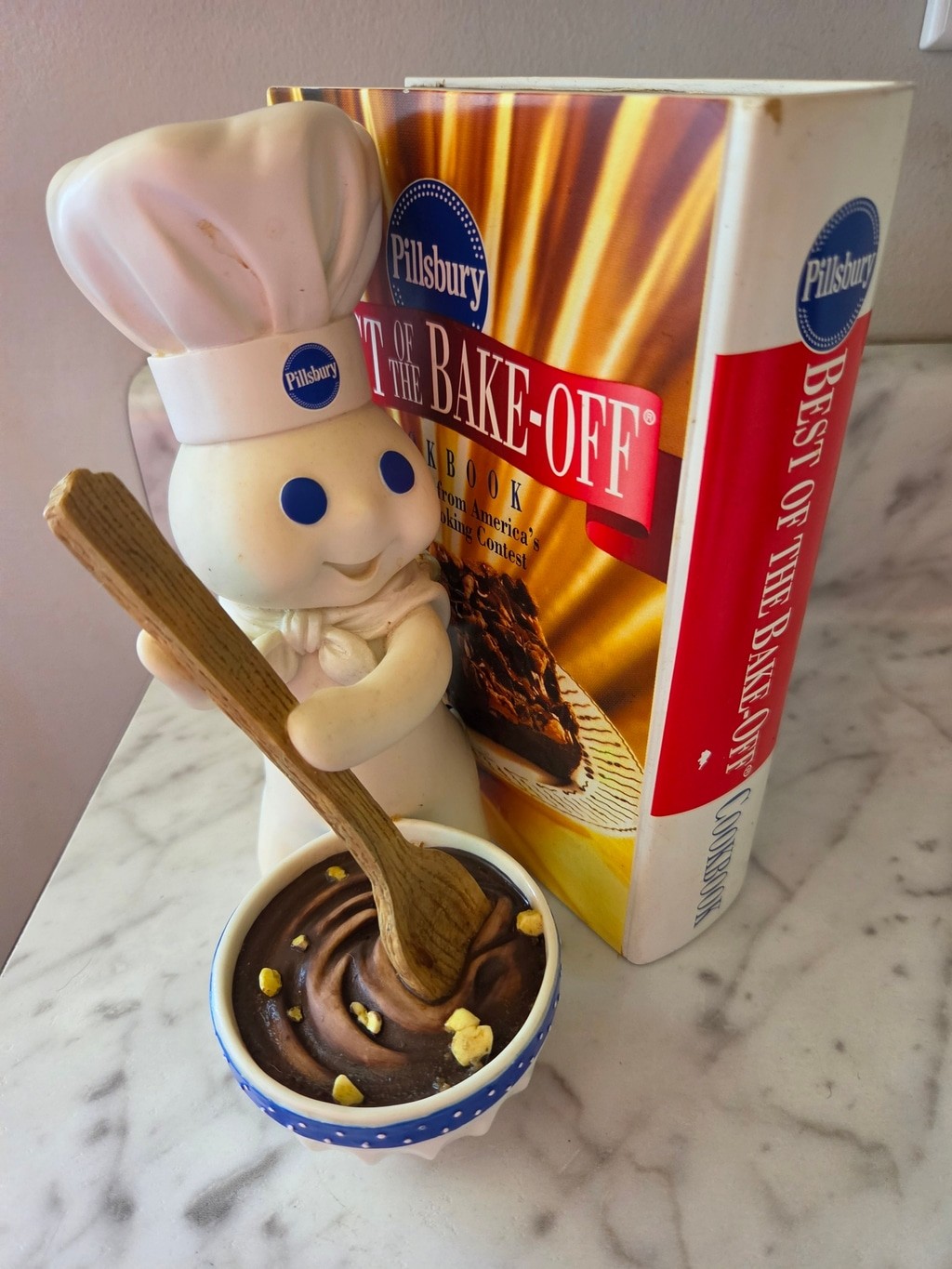 Pillsbury Doughboy Figurine and Best of the Bake-Off Cookbook Set