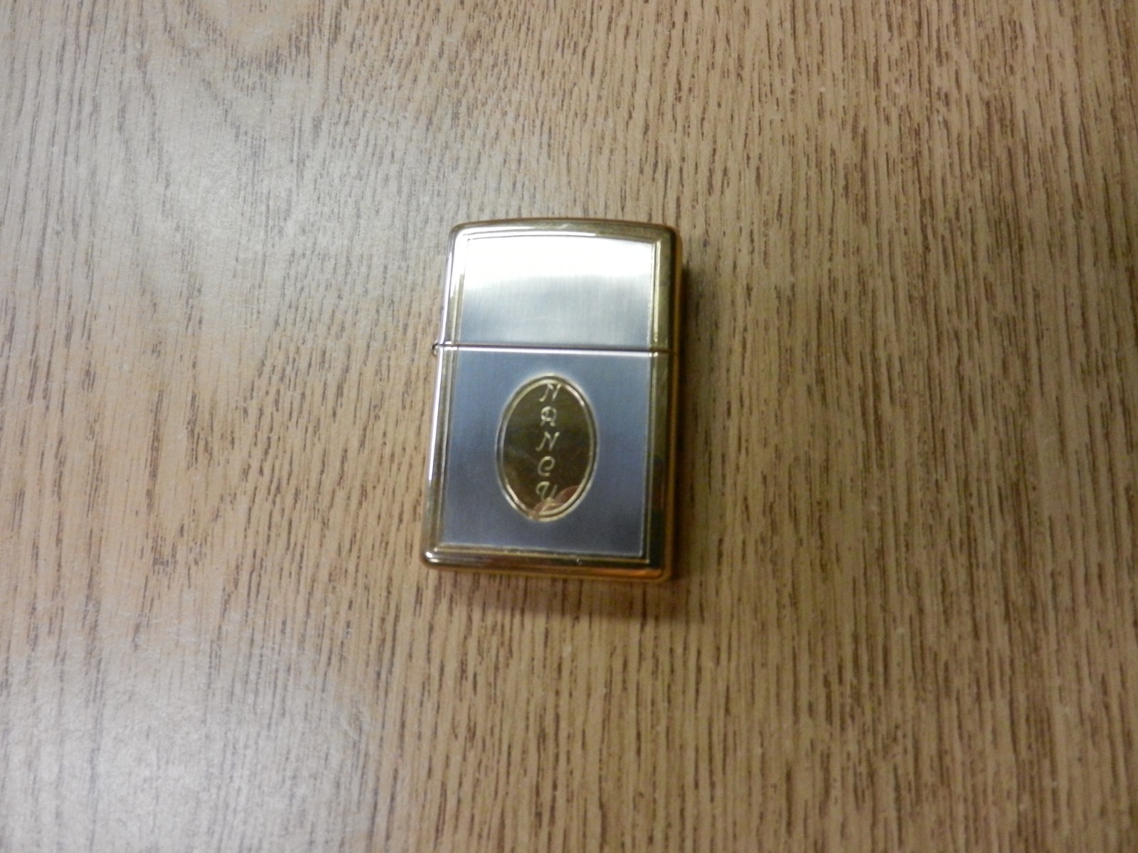 1997 Zippo Brass and Silver Classic Design Lighter Nancy From Clay Etched Unuse 