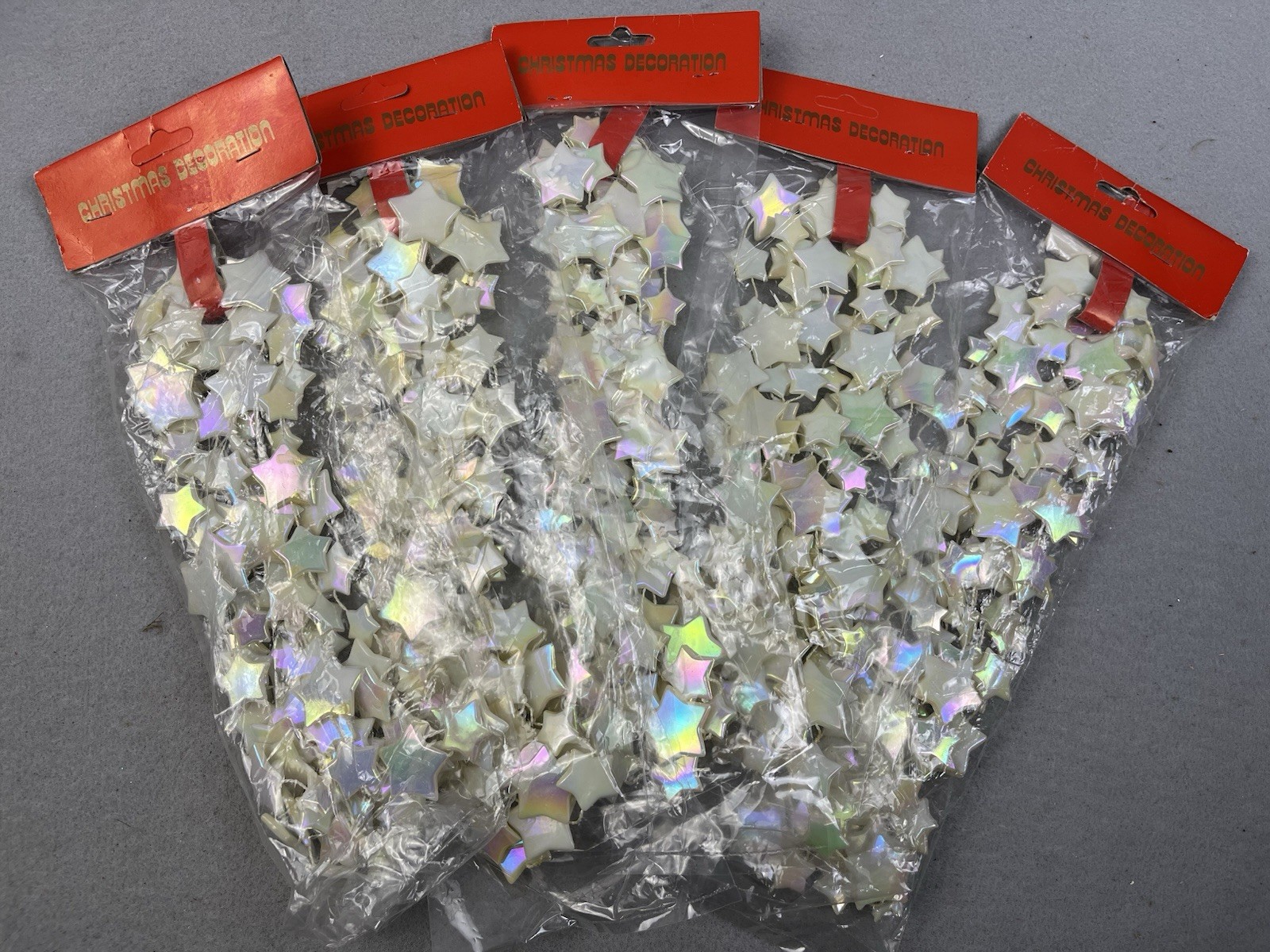 Vintage Lot 5 Celestial iridescent Stars Plastic Garland Anthropomorphic 3yds Ea