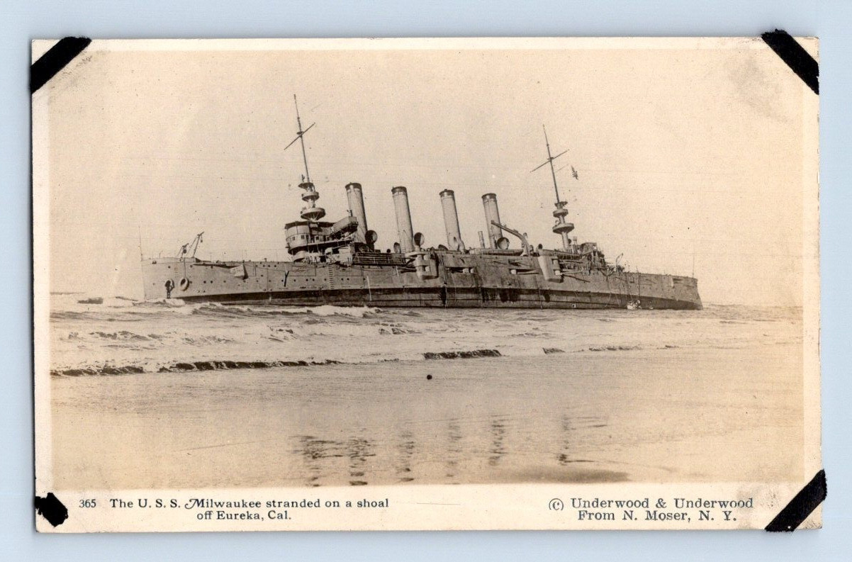 RPPC 1918. USS MILWAUKEE STRANDED ON A SHOAL OFF EUREKA, CAL. POSTCARD A1
