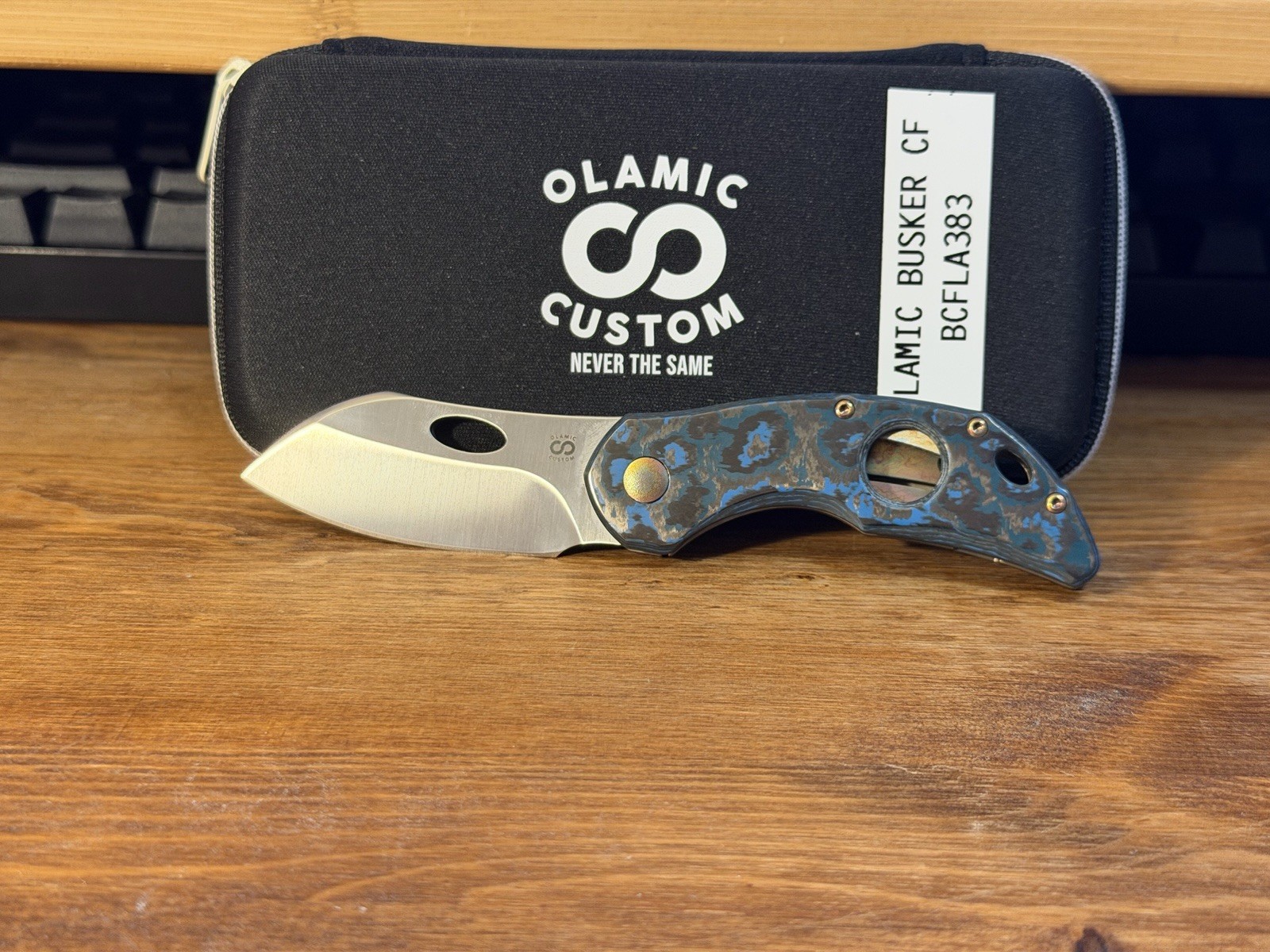 Olamic Busker Neontropic Fat Carbon Arctic Storm Titanium clip - 2.38 Olamic Busker Neontropic Fat Carbon Arctic Storm Titanium clip - 2.38