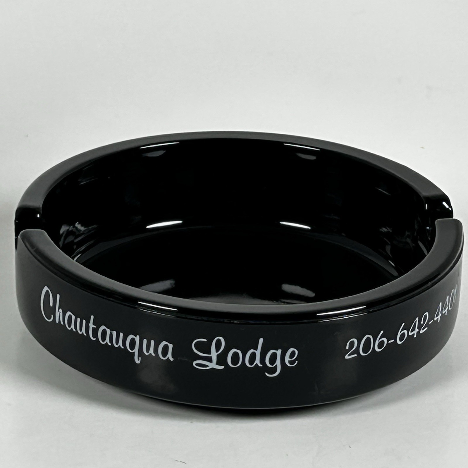 Vintage Black Glass Ashtray Chautauqua Lodge 4.25” Dia.