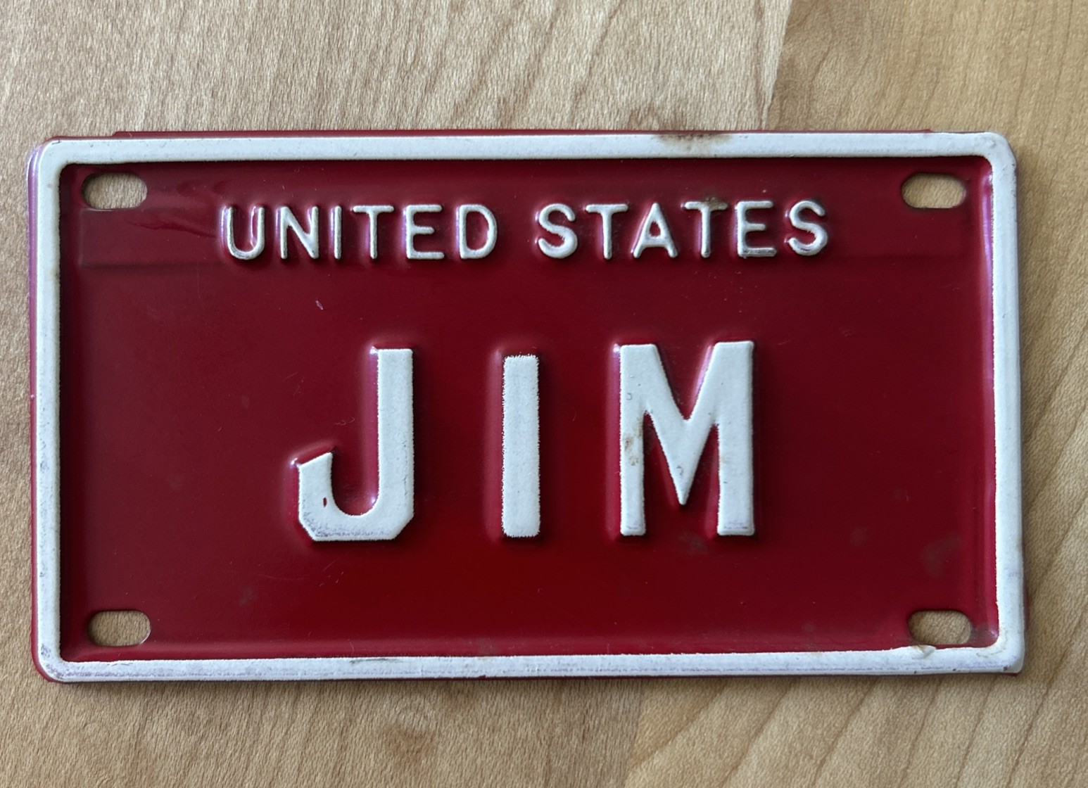 1960\'s United States Bicycle License Plate Red JIM Newberrys Tag 39 cent 