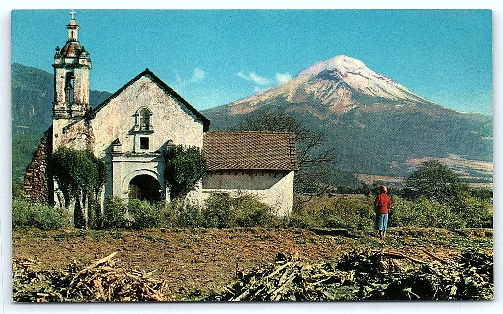 Mexican postcard: Popocatépetl volcano and church