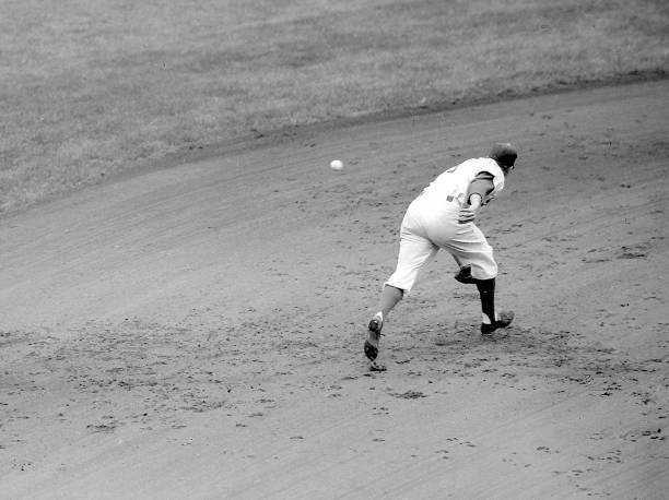 Pee Wee Reese lunges as Phil Rizzuto s liner gets past him for a s .. Old Photo