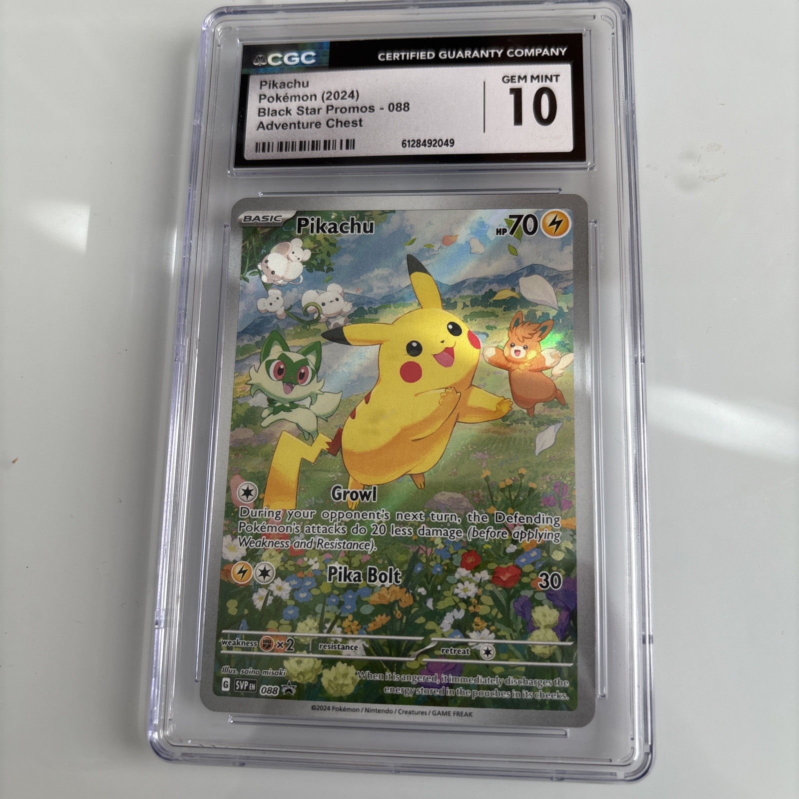 Pikachu 2024 Pokémon Black Star Promos #088 Adventure Chest Promo CGC 10