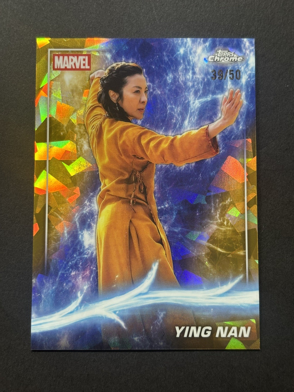 Ying Nan #113 2025 Topps Marvel Studios MCU Gold Sapphire /50