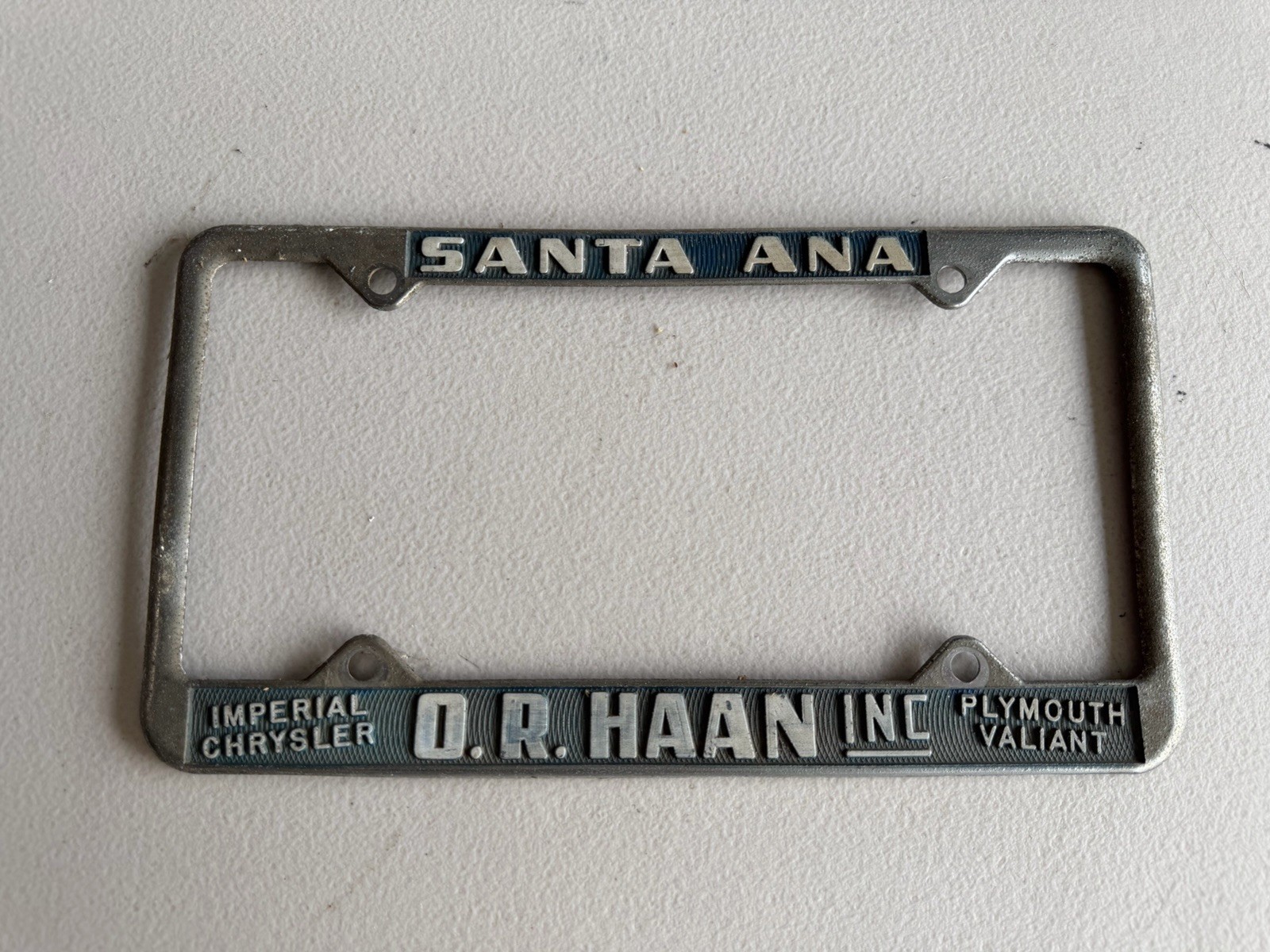 Vtg O.R. HAAN INC Chrysler Plymouth License Plate Frame SANTA ANA CA Vtg O.R. HAAN INC Chrysler Plymouth License Plate Frame SANTA ANA CA