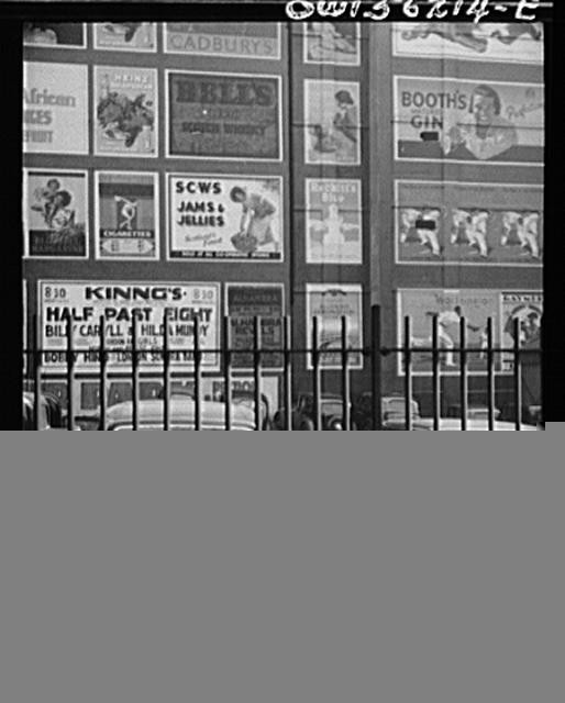 Photo:Glasgow Scotland 1950s Shop Window Advertisements and Parking Lot