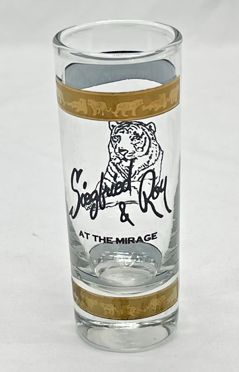 Siegfried & Roy At the Mirage Tall Shot Glass w/Ornate Gold Trim & Tiger Siegfried & Roy At the Mirage Tall Shot Glass w/Ornate Gold Trim & Tiger