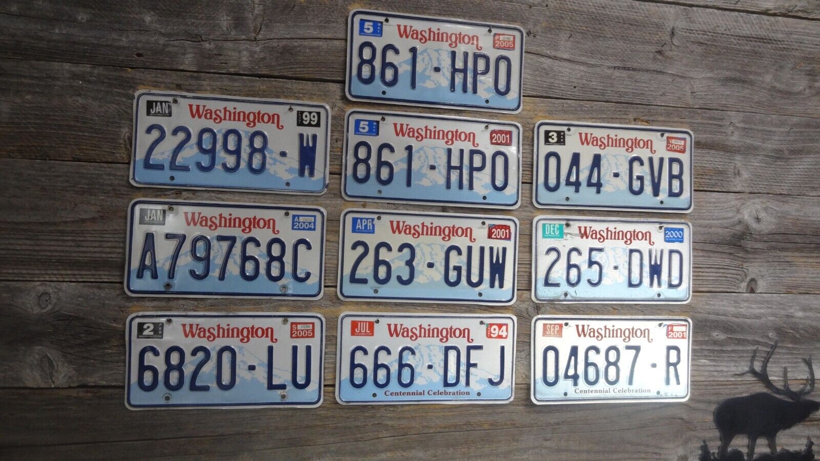 10 Washington older embossed plates with blue border from the 1990\'s Washington