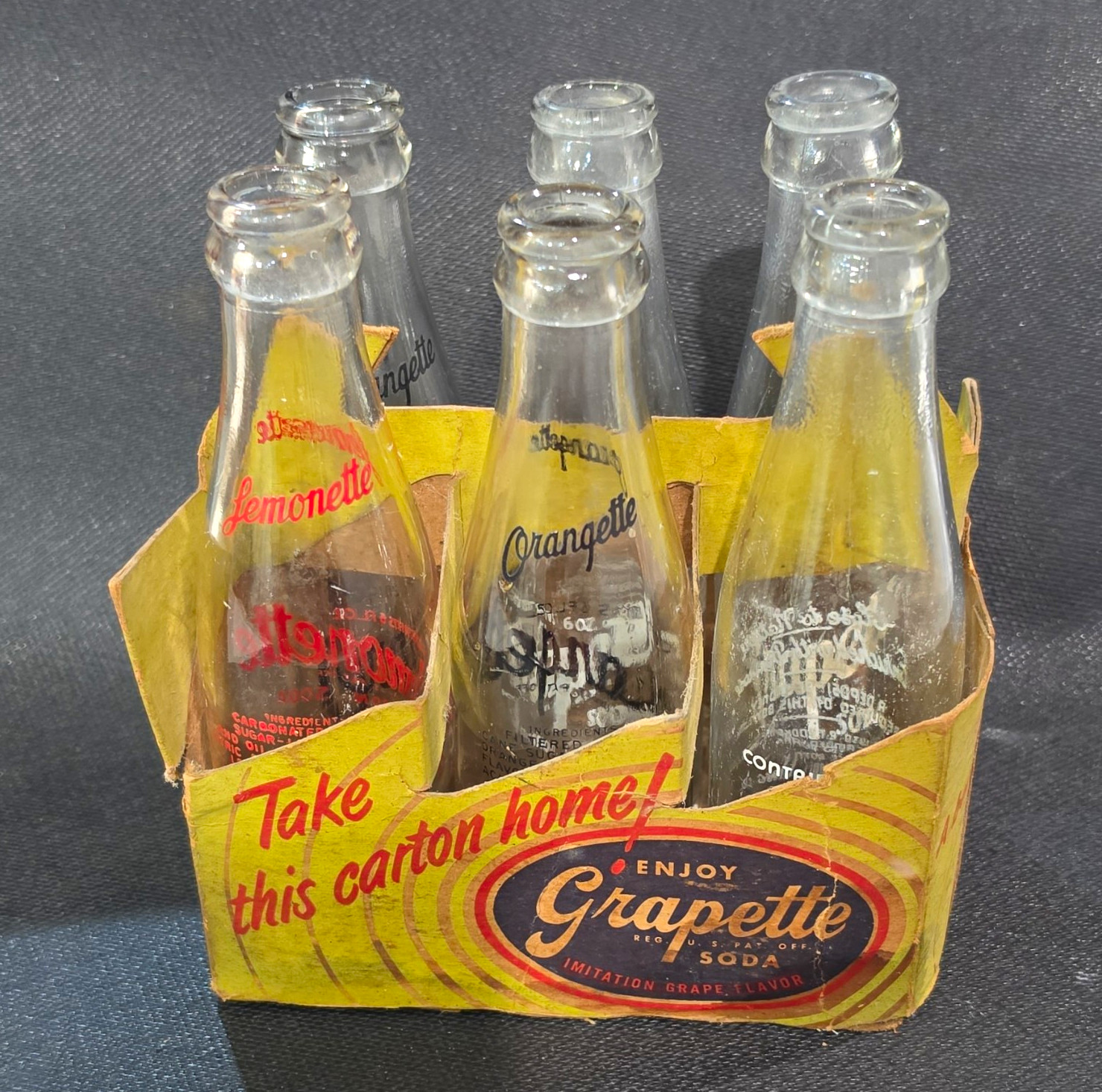 Grapette Vintage Clear Soda Glass Bottles w/ Carrier Carton Lemonette Orangette Grapette Vintage Clear Soda Glass Bottles w/ Carrier Carton Lemonette Orangette