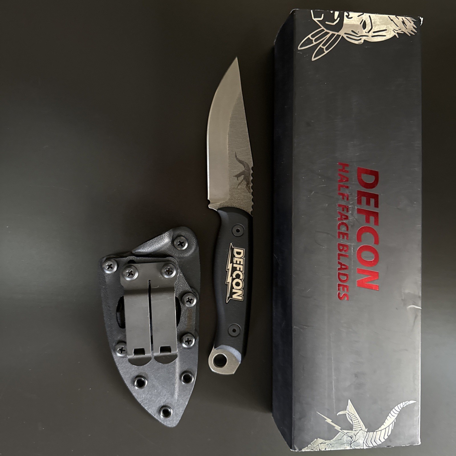 Half Face Blades x DEFCON Group Crow JR Limited Run 300.  Extra red hardware. 