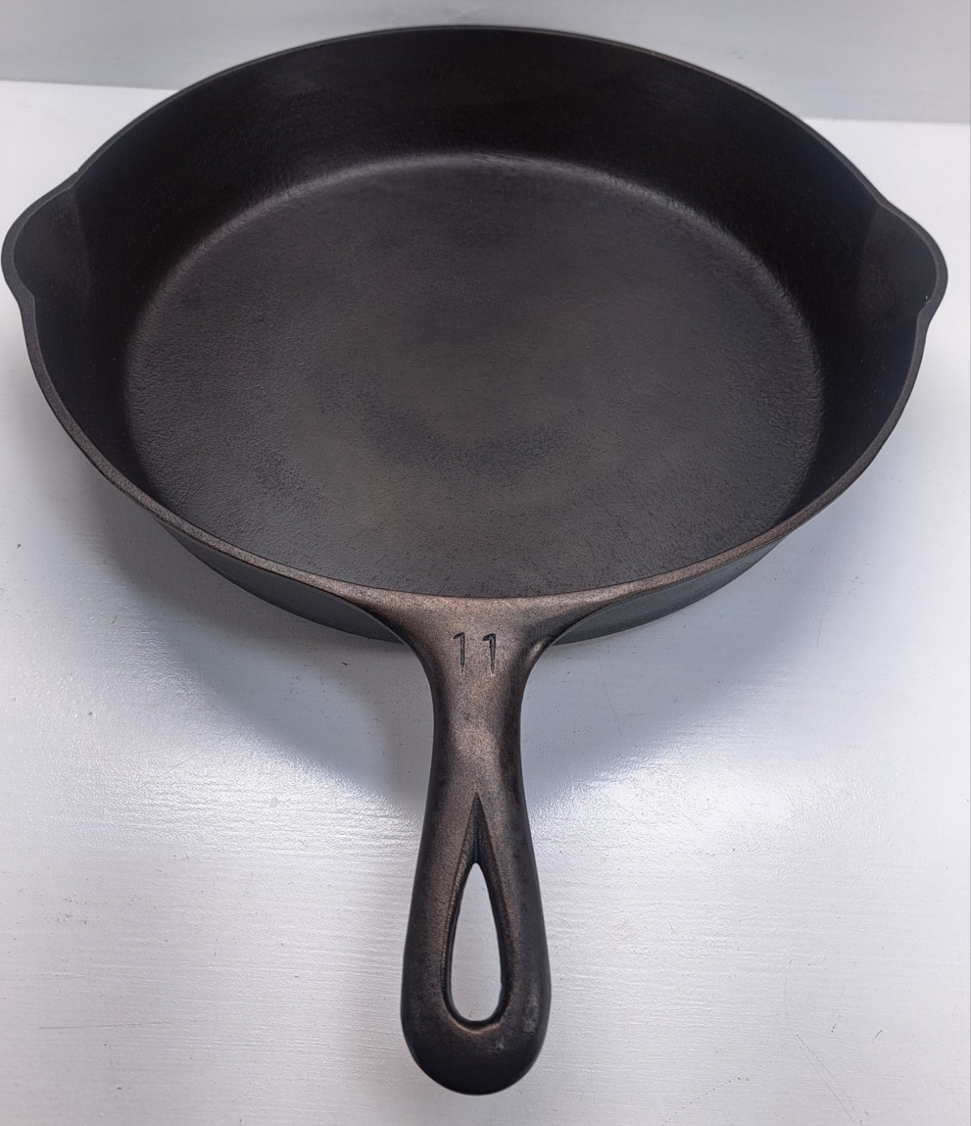Griswold Cast Iron #11 Large Block Logo Skillet w/ Heat Ring 717 Erie PA USA Griswold Cast Iron #11 Large Block Logo Skillet w/ Heat Ring 717 Erie PA USA
