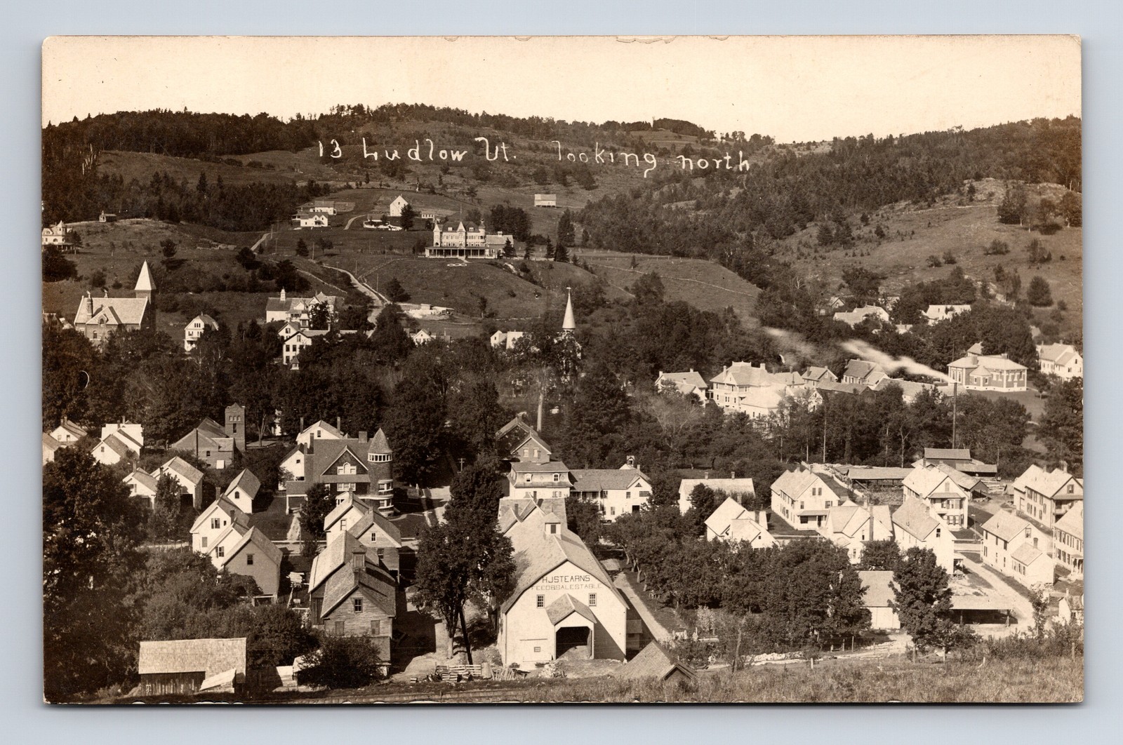 RPPC Scenic View of Ludlow VT Vermont IOOF Home HJ Stearns Feed Stable Postcard