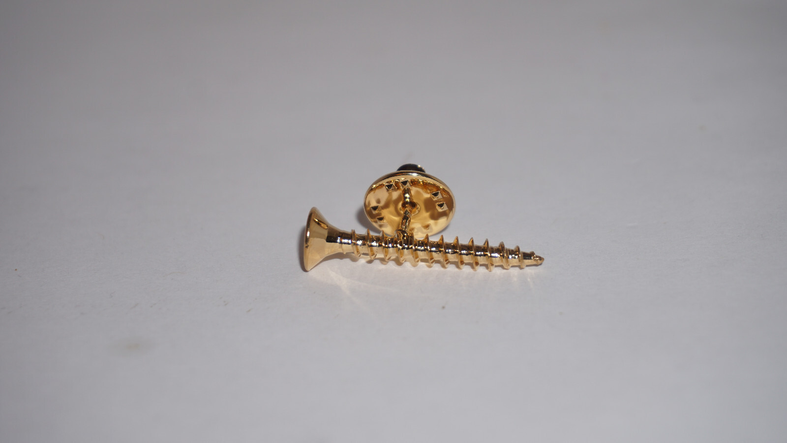 Supreme Screw Pin Gold FW23A58