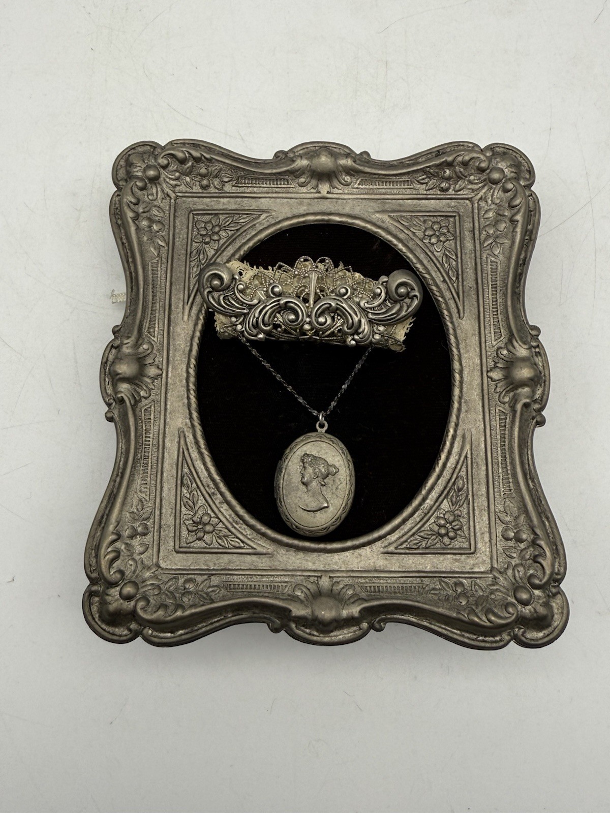 Vintage Locket  Framed Ornamental By the Vintage Victorian Collection Silver