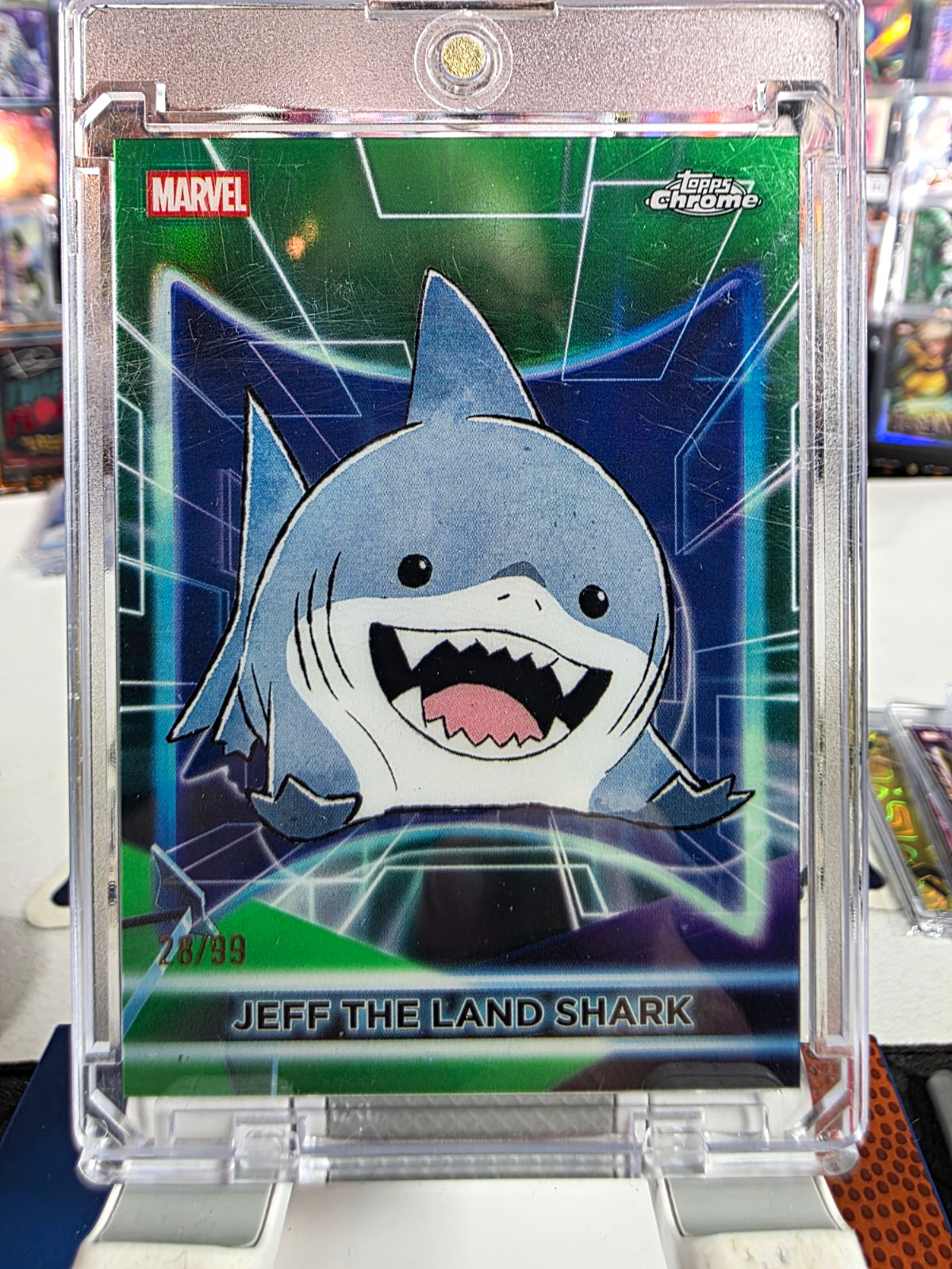 2026 Topps Marvel Neon Topps Chrome Jeff the Land Shark 28/99
