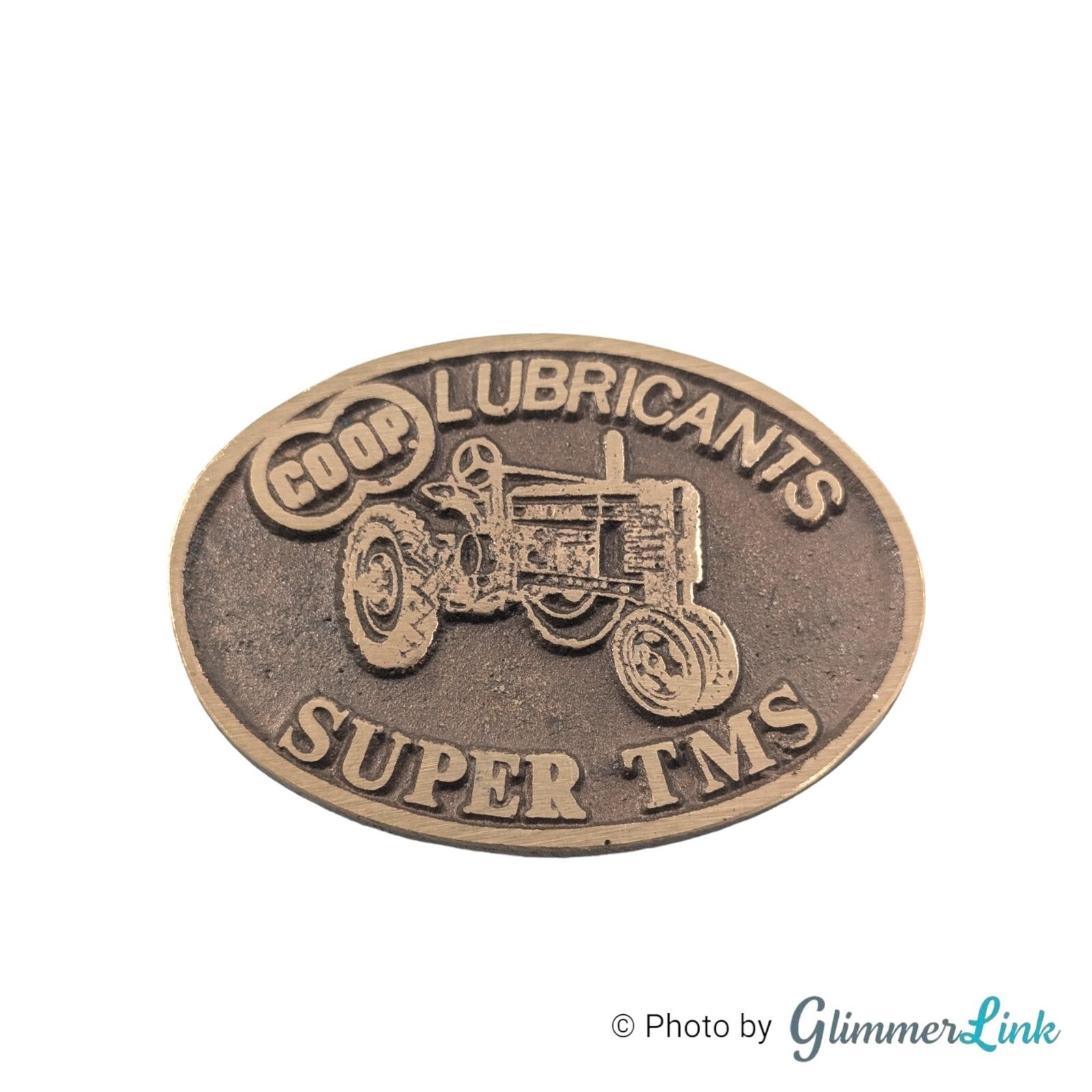 Vintage Farmland Ind John Deere Tractor Lubricant Oval Brass Belt Buckle