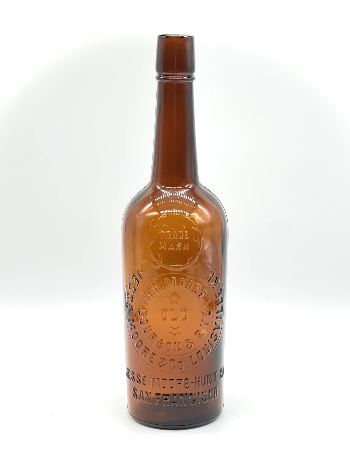 Vintage Jesse Moore Brown Glass Bourbon & Rye Bottle—12”