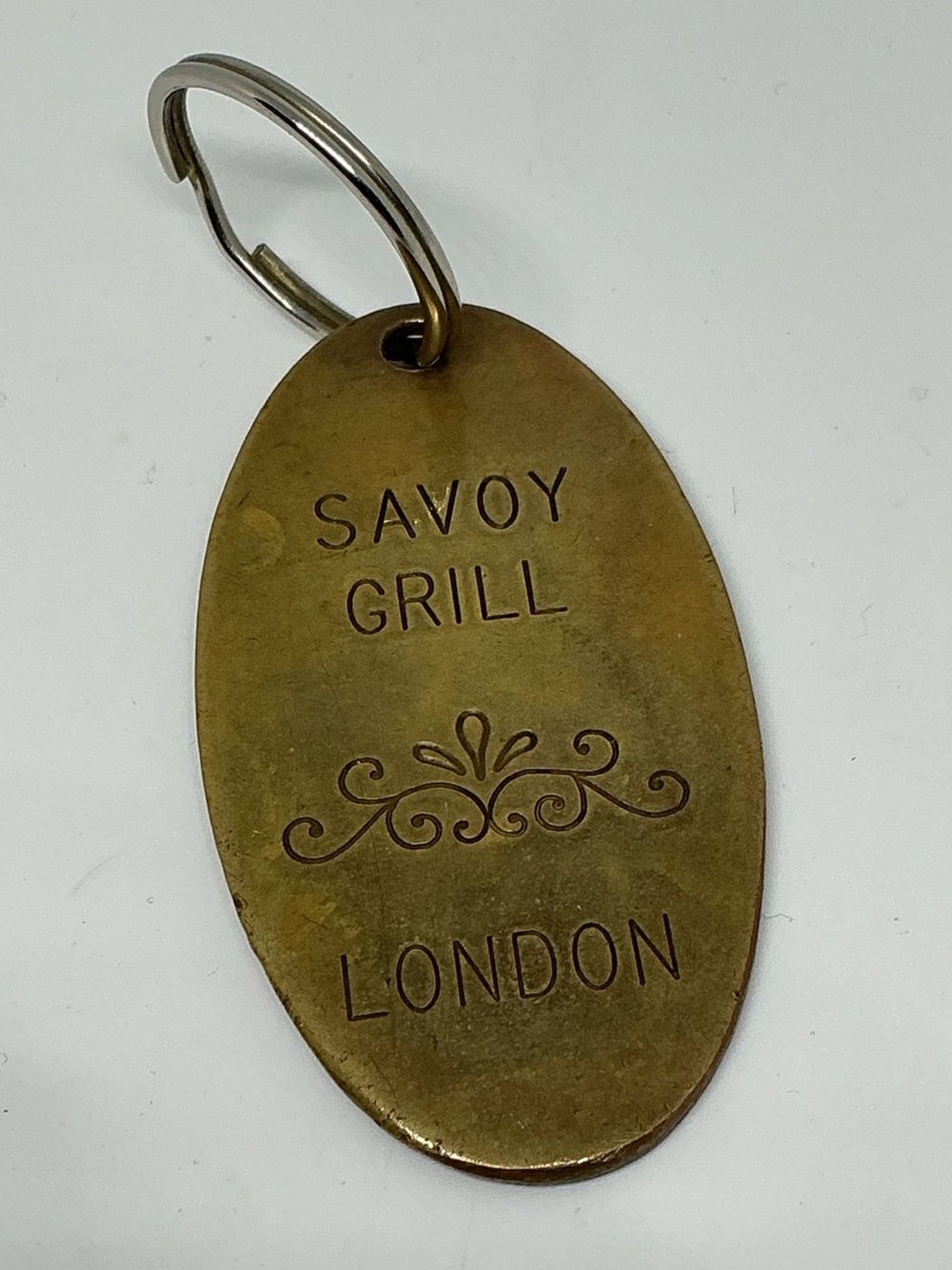 VTG Savoy Grill London Brass Keychain FOB Lowell Sigmund 1976 VTG Savoy Grill London Brass Keychain FOB Lowell Sigmund 1976