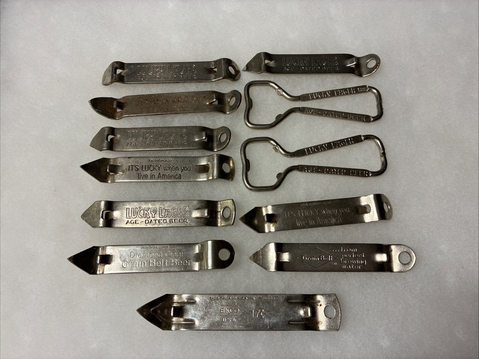 (12) VTG Lucky Lager Beer Grain Belt & EKCO 17c. Advertising Bottle Openers Bar
