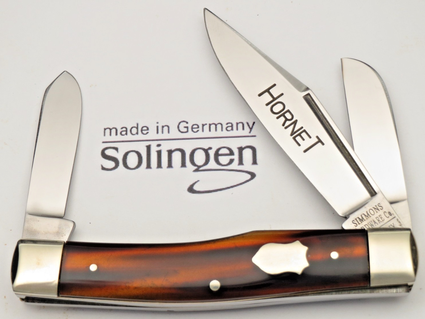 1990's  SIMMONS HARDWARE GERMANY by Olbertz - Stock Knife - Nice Amber Handles